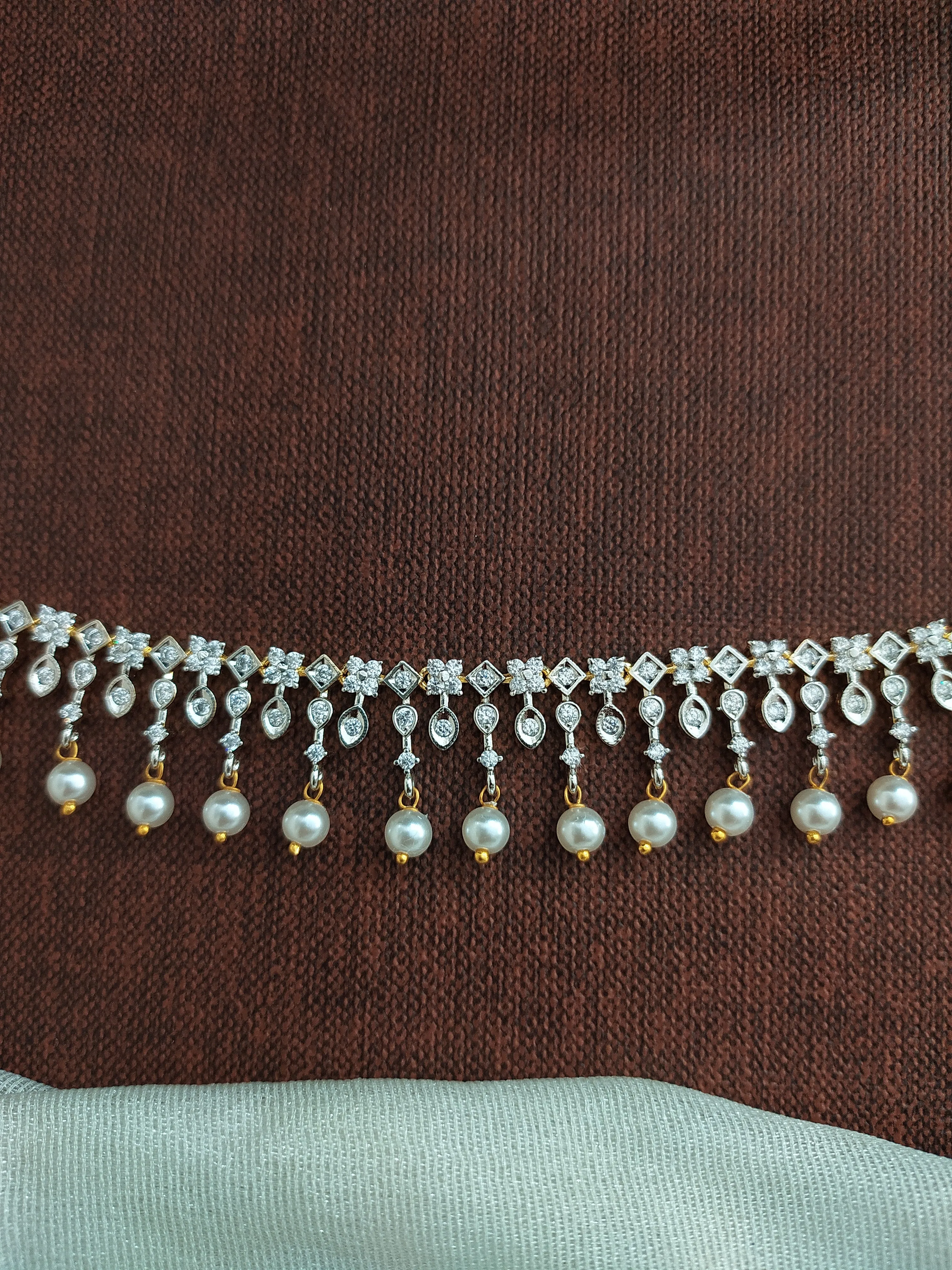 Diamond Finish Two-Tone Zircon Hip Chain with White Stones & Pearl Drops