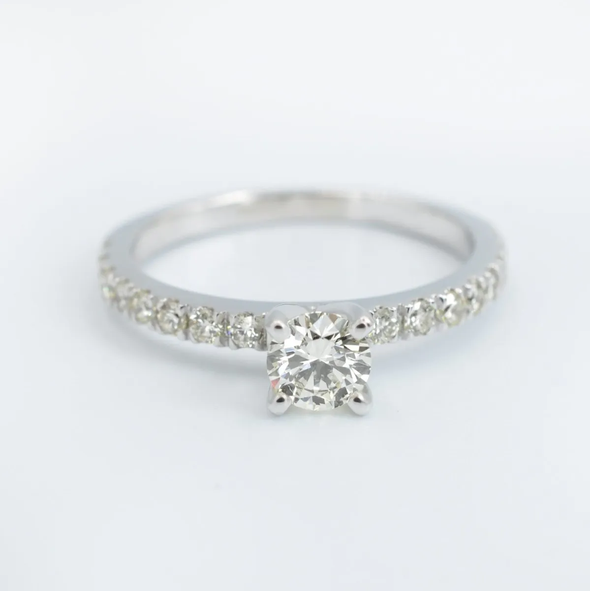 Distinctive 0.95 CT Round Cut Diamond Engagement Ring in 14KT White Gold