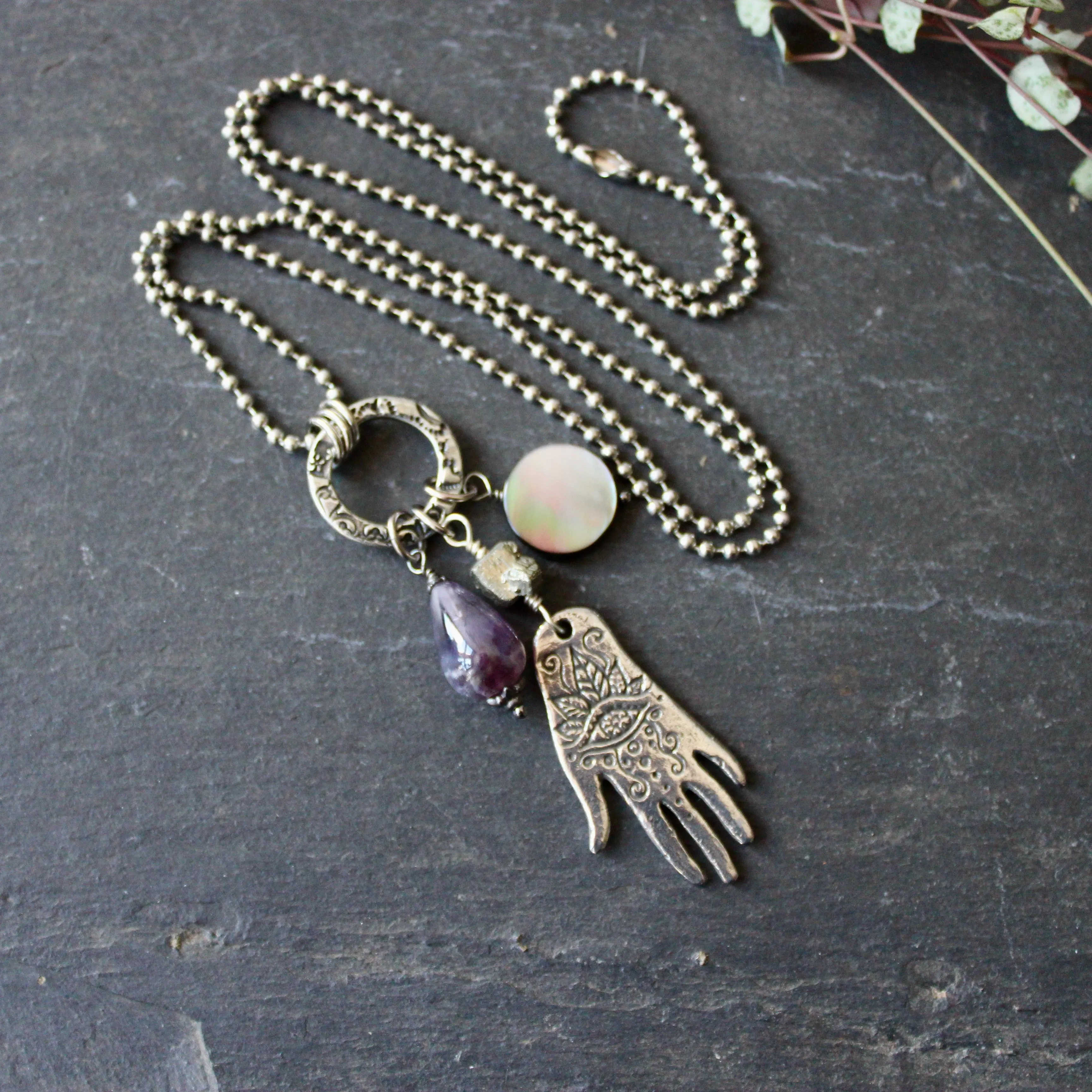 Palmist's Cantrip Long Statement Charm Necklace.