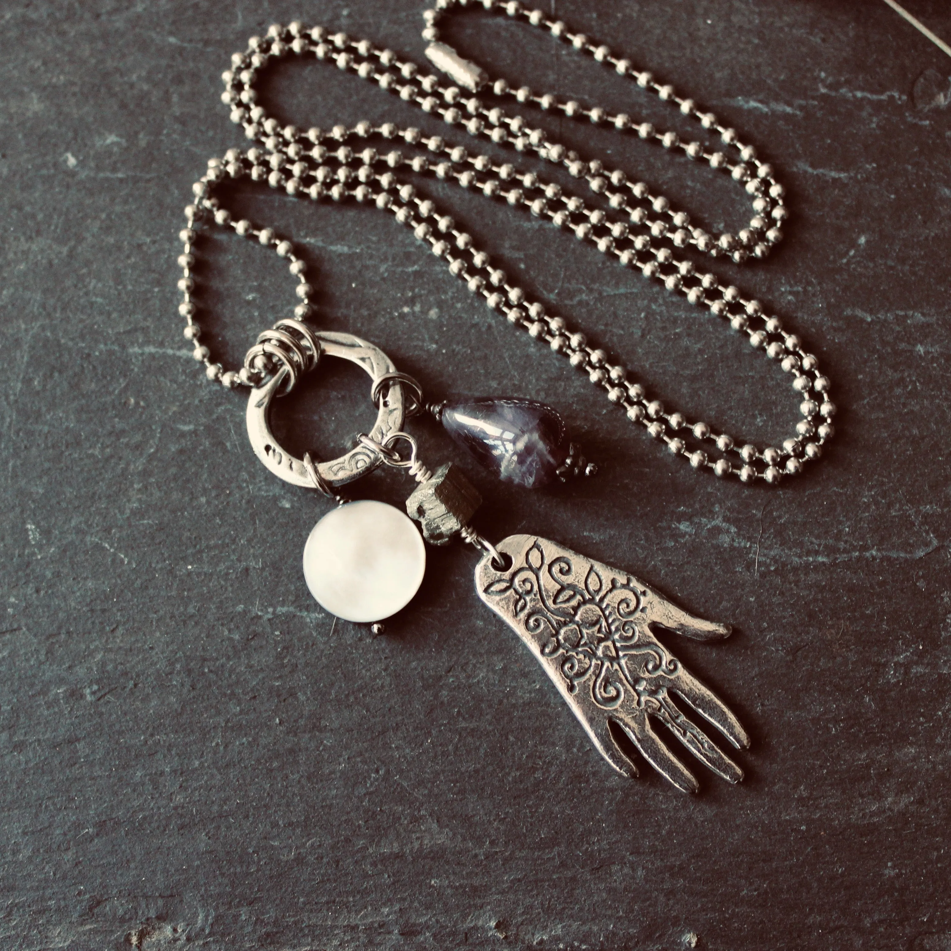 Palmist's Cantrip Long Statement Charm Necklace.