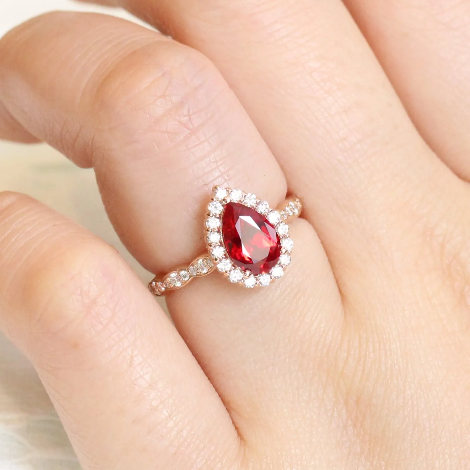 Pear Ruby Engagement Ring in Luna Halo Diamond Scalloped Band