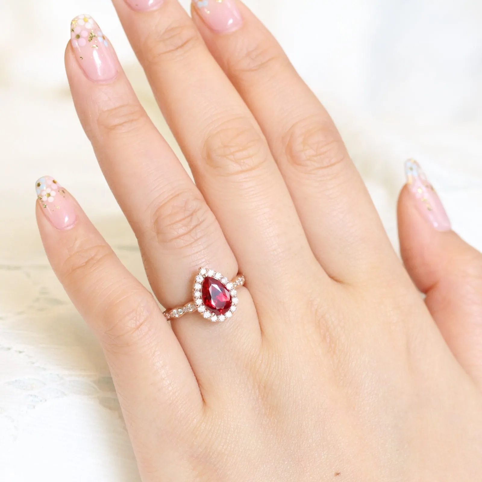 Pear Ruby Engagement Ring in Luna Halo Diamond Scalloped Band