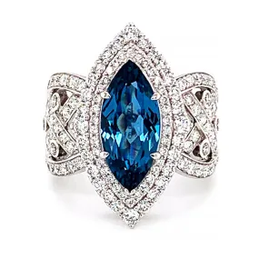 Platinum engagement ring with Marque Rare Blue Zircon and diamonds