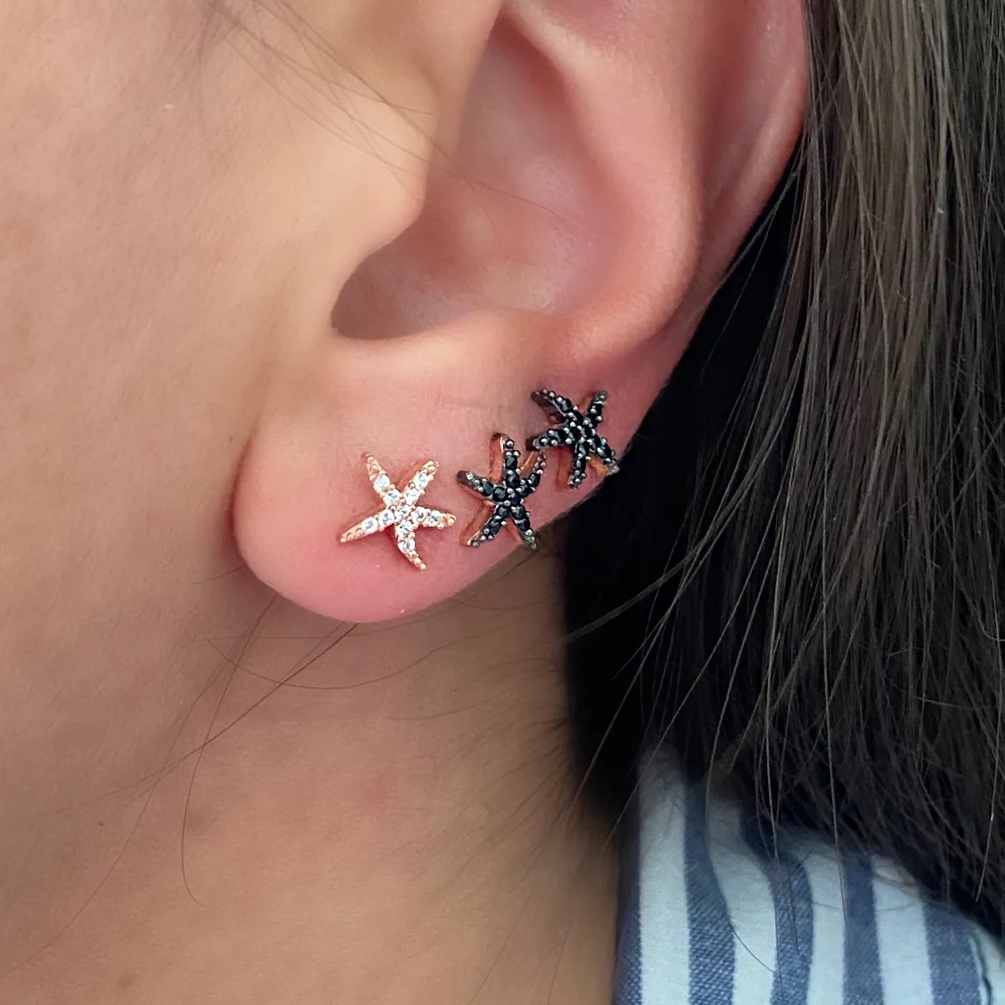 Star shaped stud with zircon stones