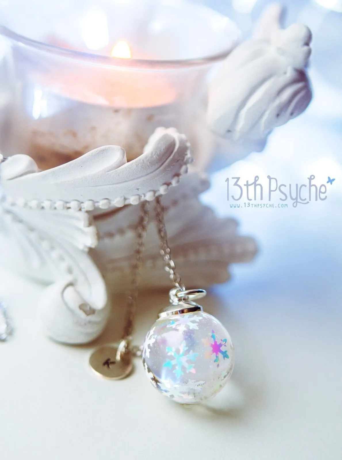 Winter inspired snowflake resin ball necklace